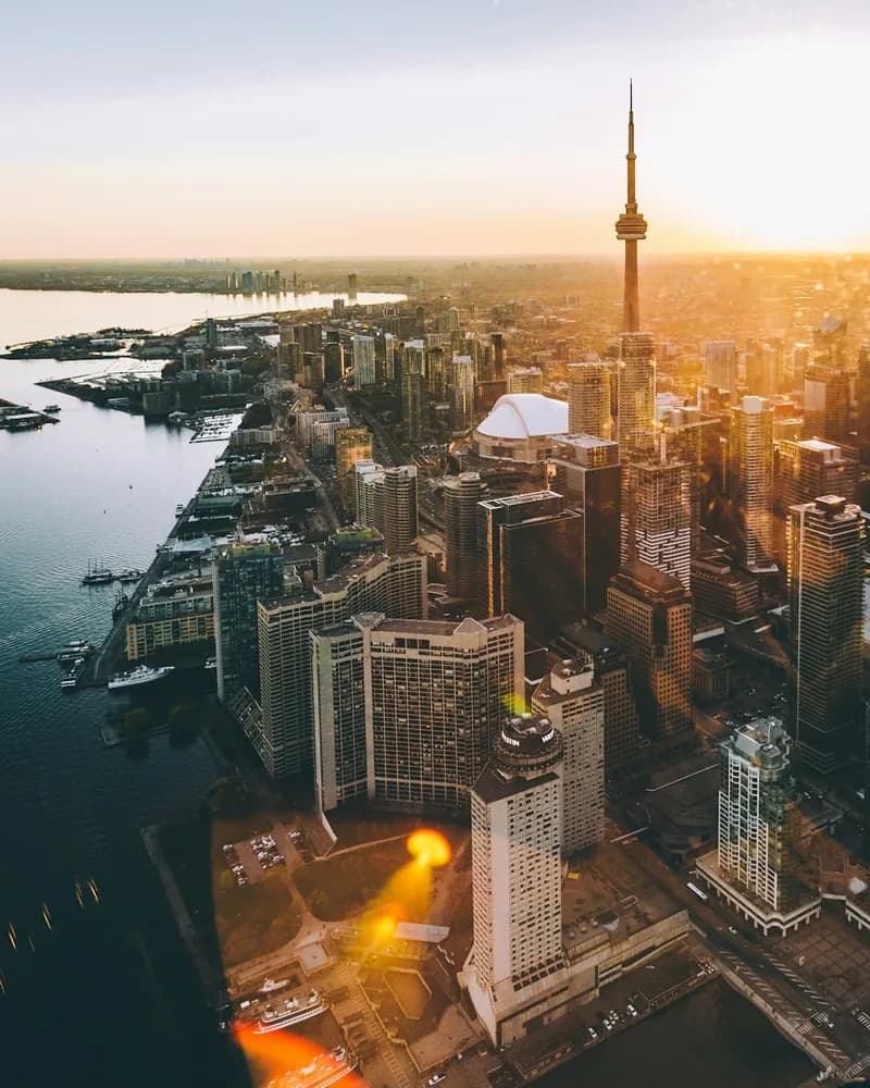 Toronto skyline at sunset over Lake Ontario