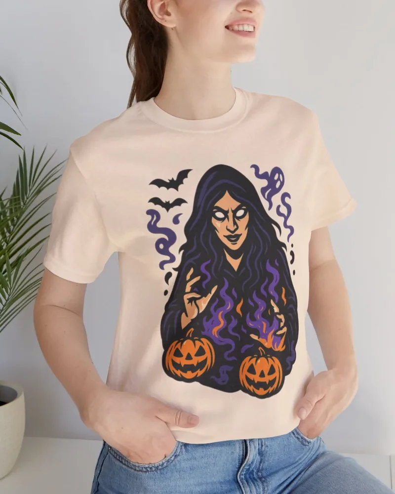 Halloween witch and pumpkin graphic tee, designed and printed in Canada
